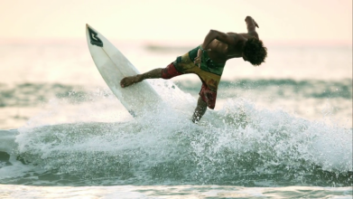 Surfer at Playa Tamarindo